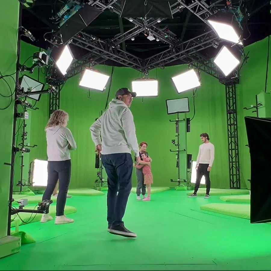 Motion-capture session on a green-screen stage