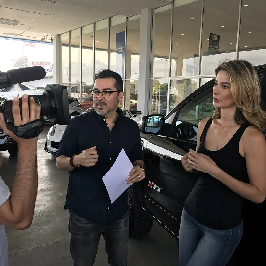 Sharing a moment with an interview guest on set